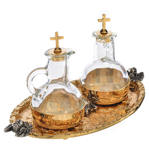 Set of cruets in cast brass