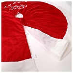 Red Christmas tree skirt with Santa Claus and Merry Christmas inscription. 125 cm.